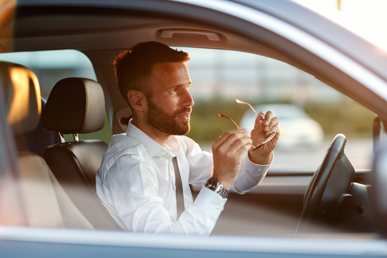 businessman_inside_his_car_high.jpg